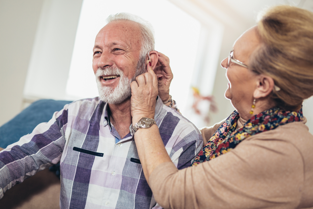 Older,man,and,woman,or,pensioners,with,a,hearing,problem