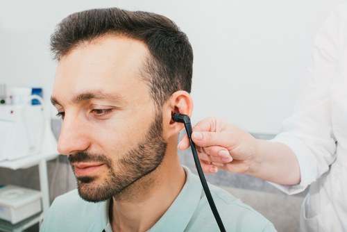 Diagnosis,of,hearing,impairment,,tympanometry,,hearing,test.,a,man,during